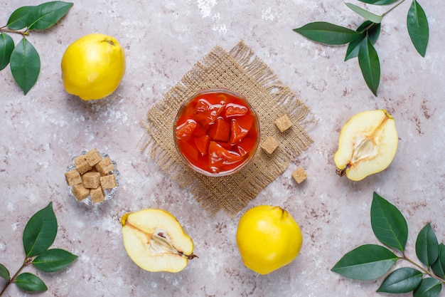 Delicious and healthy homemade quince jam in glass,top view