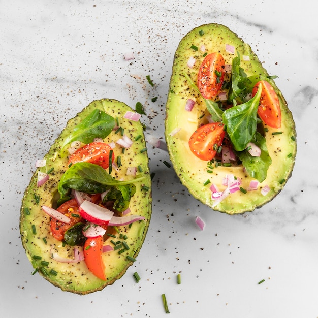 Delicious healthy salad in avocado assortment