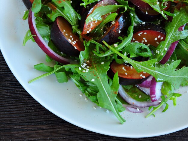 Delicious and healthy salad with plums.