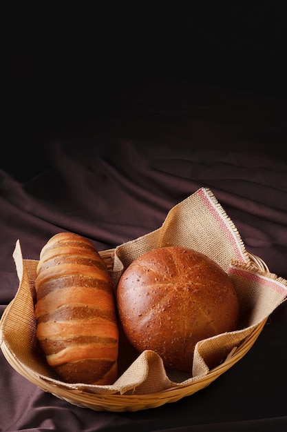 Delicious homemade artisan bread with natural grains in a wicker basket