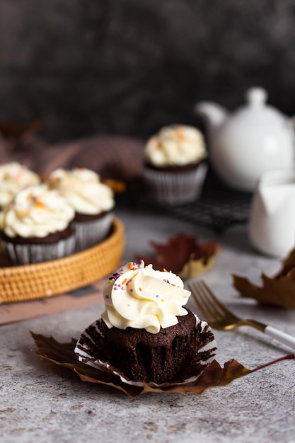 Delicious homemade cupcakes with white cream and berry filling