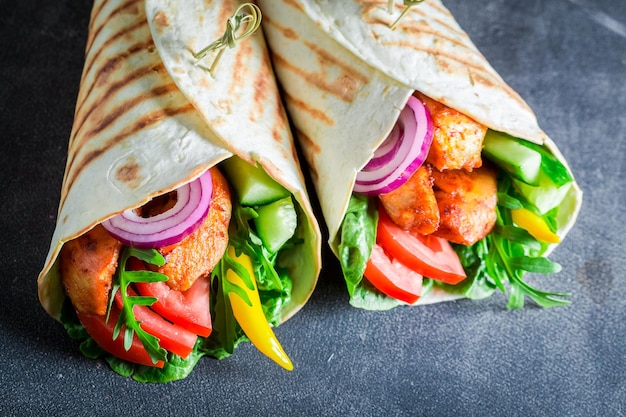 Delicious and homemade grilled tortilla with chicken and vegetables