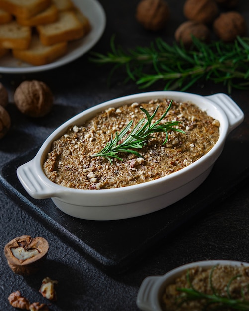 Delicious homemade liver pate with rosemary. Family dinner with the family, traditions. Healthy food, slow food.