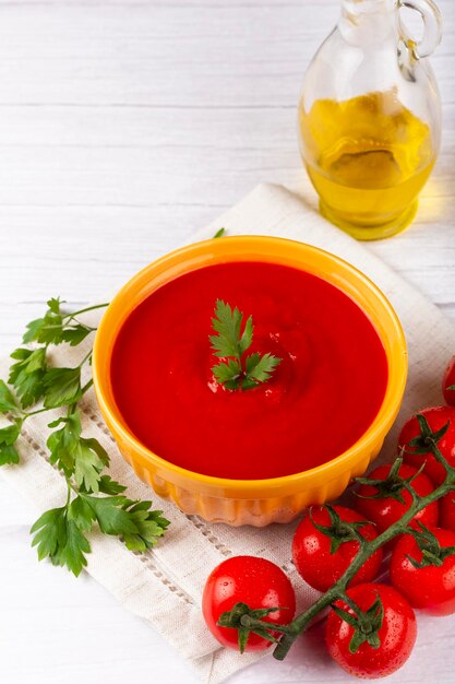 Delicious homemade tomato soup in bowl.