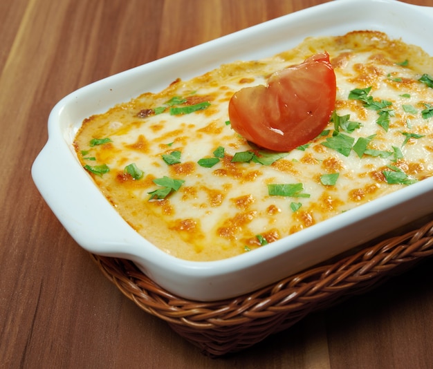 Delicious homemade vegetable lasagna with tomato, paprika, onion and zucchini