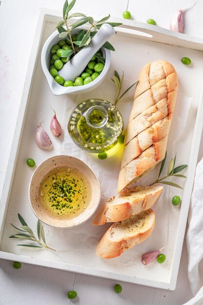 Delicious and hot baguette made of garlic and olive oil