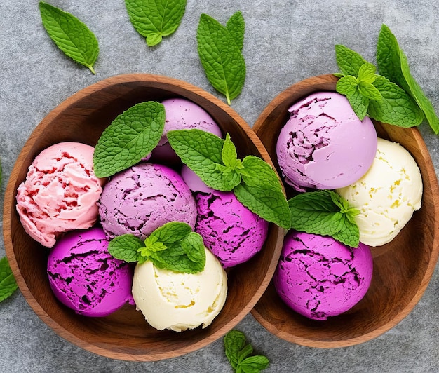 delicious ice cream scoops with fresh berries on grey background