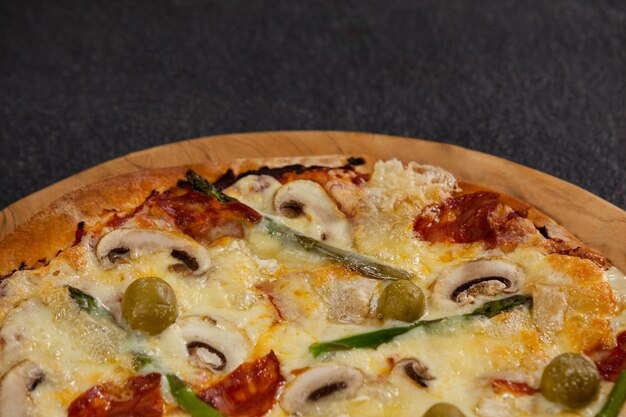 Delicious italian pizza served on wooden board