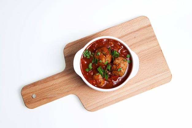 Delicious juicy meatballs in spicy tomato sauce