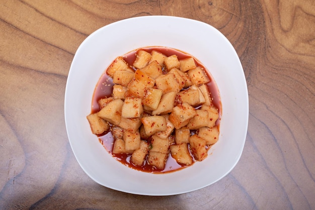 Delicious-looking Kkakdugi Kimchi served in a bowl