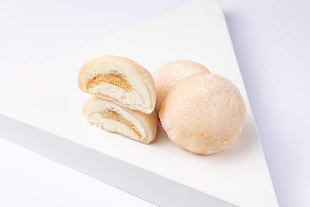 Delicious mochi on a white background, close-up. Traditional Japanese dessert