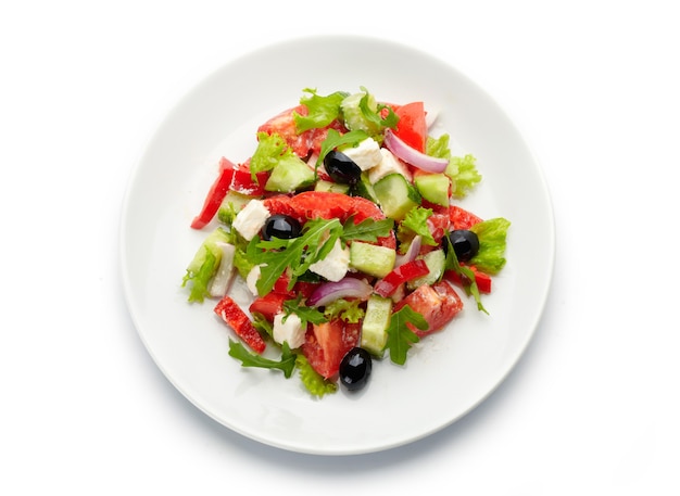 Delicious and nutritious, a fresh Greek Salad on white