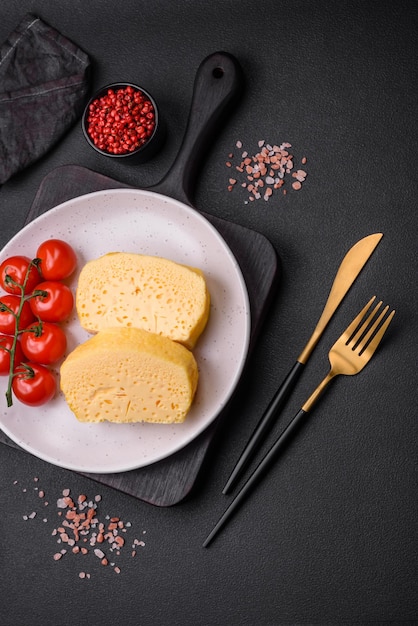 Delicious omelet with milk spices and herbs cut into large pieces