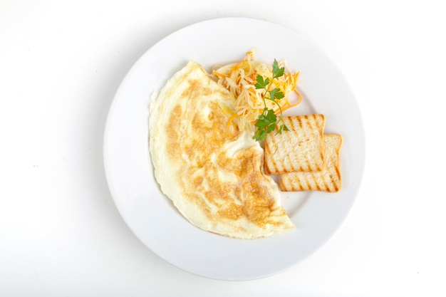 Delicious omelet with white bread toast and cabbage