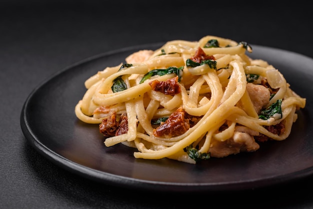 Delicious pasta with spinach sun dried tomatoes cheese onions