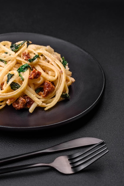 Delicious pasta with spinach sun dried tomatoes cheese onions