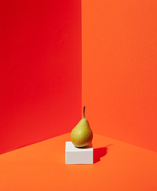 Delicious pear with orange background