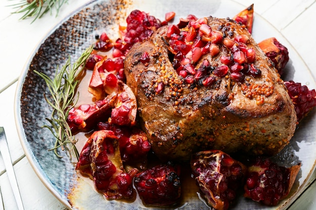 Delicious piece of meat fried with pomegranate