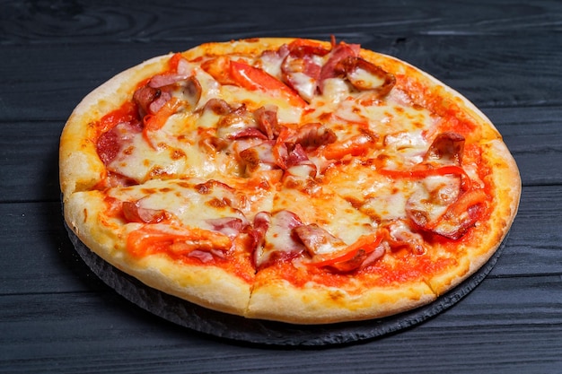 Delicious pizza on wooden table Food delivery