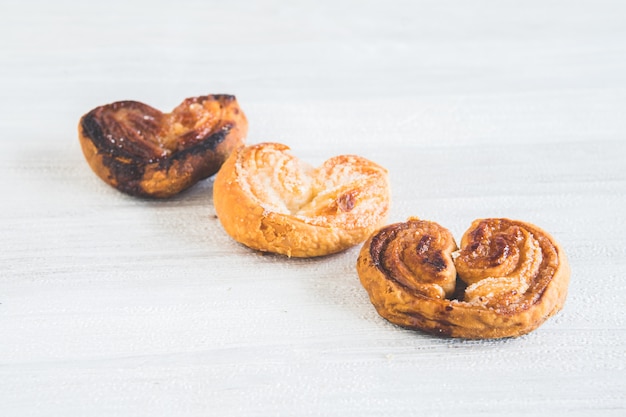 Delicious puff pastries in the shape of hearts