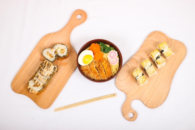 Delicious ramen and sushi isolated on white background