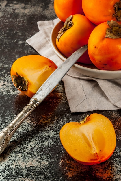 Delicious raw ripe persimmon fruits