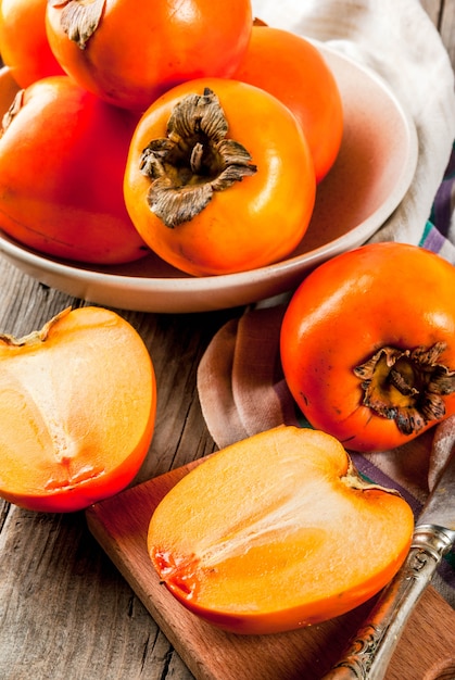 Delicious raw ripe persimmon fruits