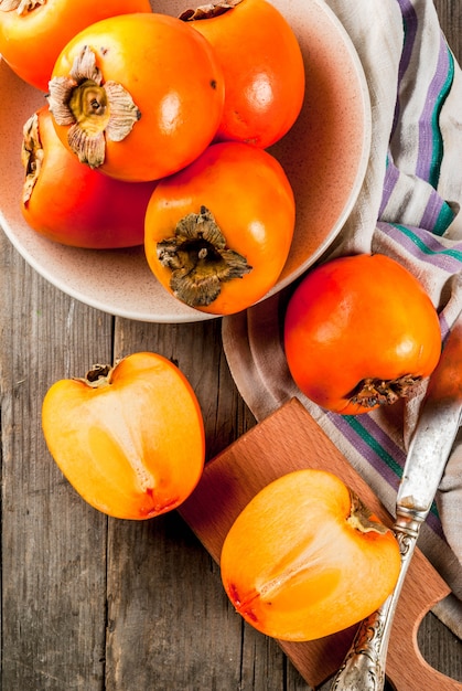 Delicious raw ripe persimmon fruits