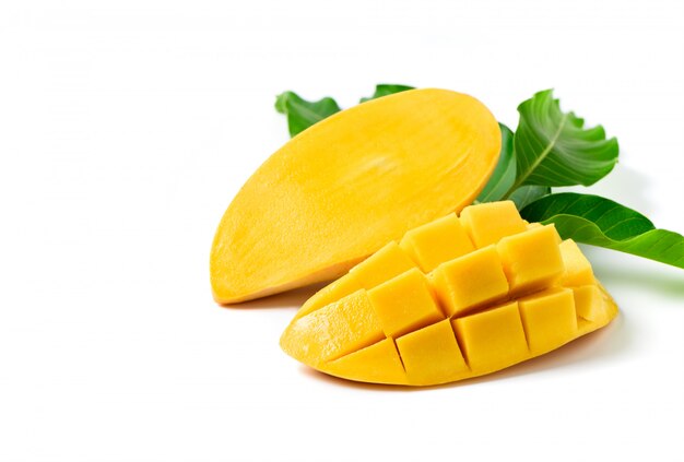 Delicious ripe yellow mango with green leaf