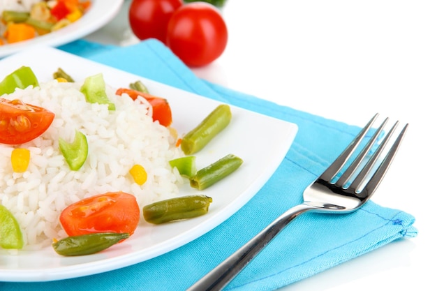 Delicious risotto with vegetables isolated on white