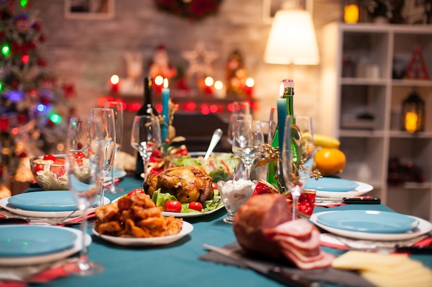 Delicious roasted chicken on the table for christmas celebration.