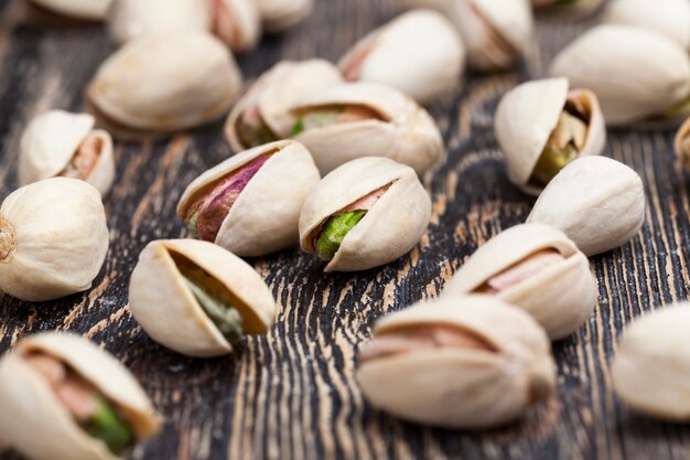 Delicious and salty pistachio nuts, roasted pistachios sprinkled with salt for flavor