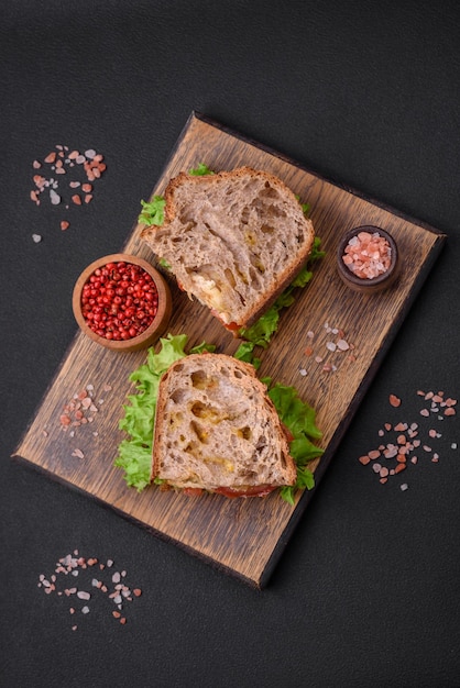 Delicious sandwich with crispy toast chicken tomatoes and lettuce