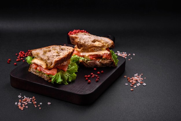 Delicious sandwich with crispy toast chicken tomatoes and lettuce