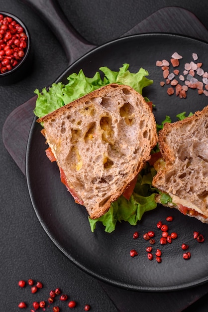 Delicious sandwich with crispy toast chicken tomatoes and lettuce