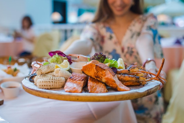 Delicious seafood of fresh seafood with shrimps crabs salmon squid and mussels at luxury restaurant