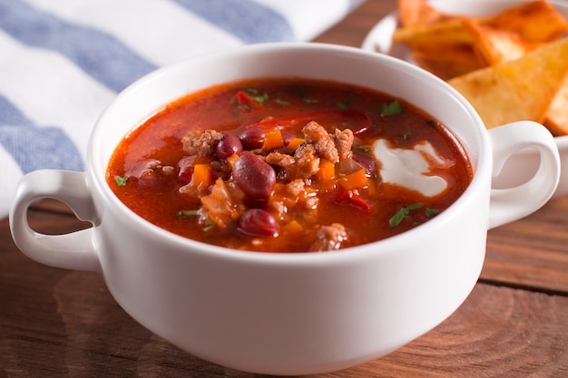 Delicious soup with beans, garlic and fresh tomatoes