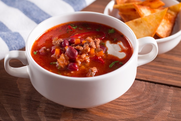 Delicious soup with beans, garlic and fresh tomatoes