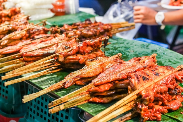 Delicious spicy grilled chicken meat on sticks, Thai food