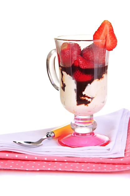 Delicious strawberry dessert in glass vase isolated on white