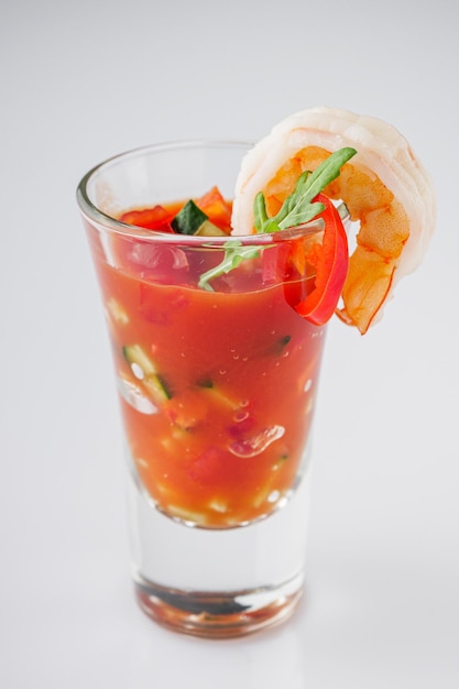 delicious summer gazpacho cocktail on a white background