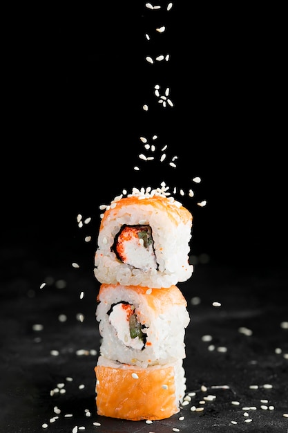 Delicious sushi rolls on desk