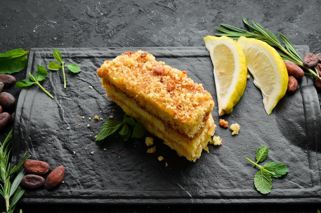 Delicious sweet cake with lemon and zest Top view Free space for your text