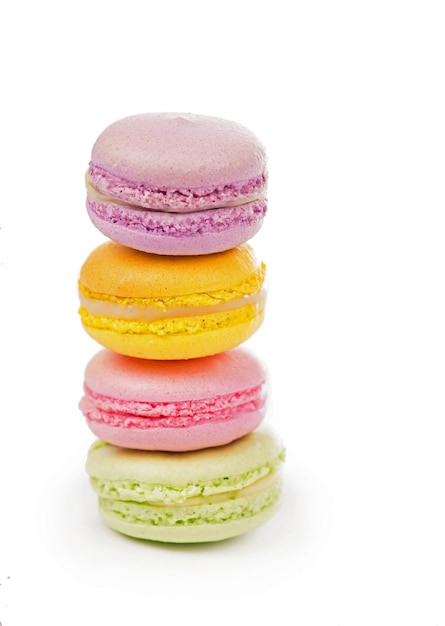 Delicious three multicolored macaroon on a white background