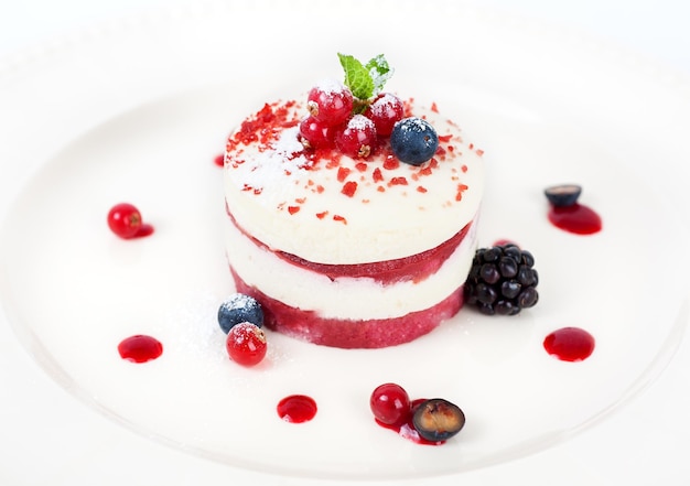 Delicious tiramisu cake with fresh berries