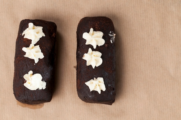 Delicious traditional cake potato , the cake is made of a large number of ingredients, the outside of the cake is covered with a layer of powdered sugar with cocoa and butter cream