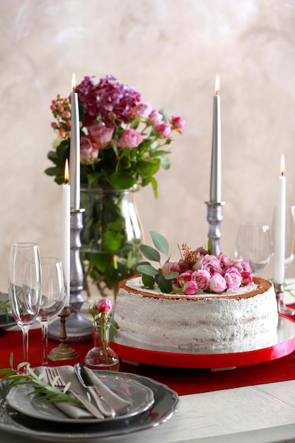 Delicious wedding cake on beautifully served table