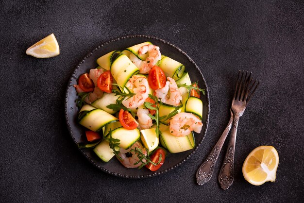 Delisicous fresh seafood salad with shrimps and zucchini