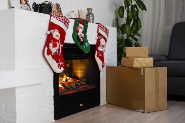 delivery boxes near fireplace. Ecommerce website online shopping delivery ads.