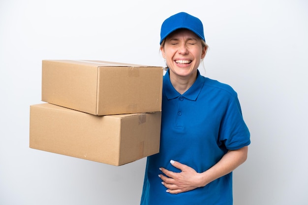 Delivery caucasian woman isolated on white background smiling a lot